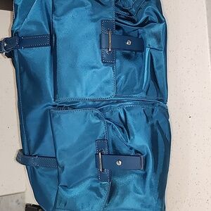 Tumi brand travel tote